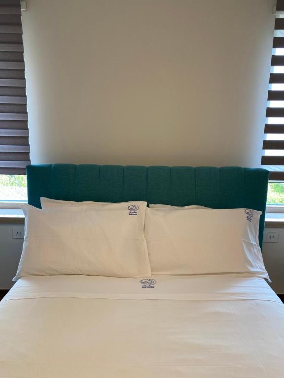 Postel nebo postele na pokoji v ubytování RoSea B&B Formia
