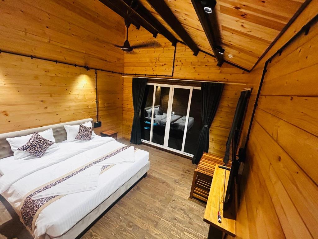 Postel nebo postele na pokoji v ubytování Seclude Eco Cottages