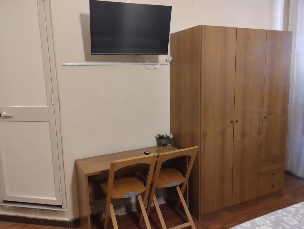 TV a/nebo společenská místnost v ubytování Al Duomo