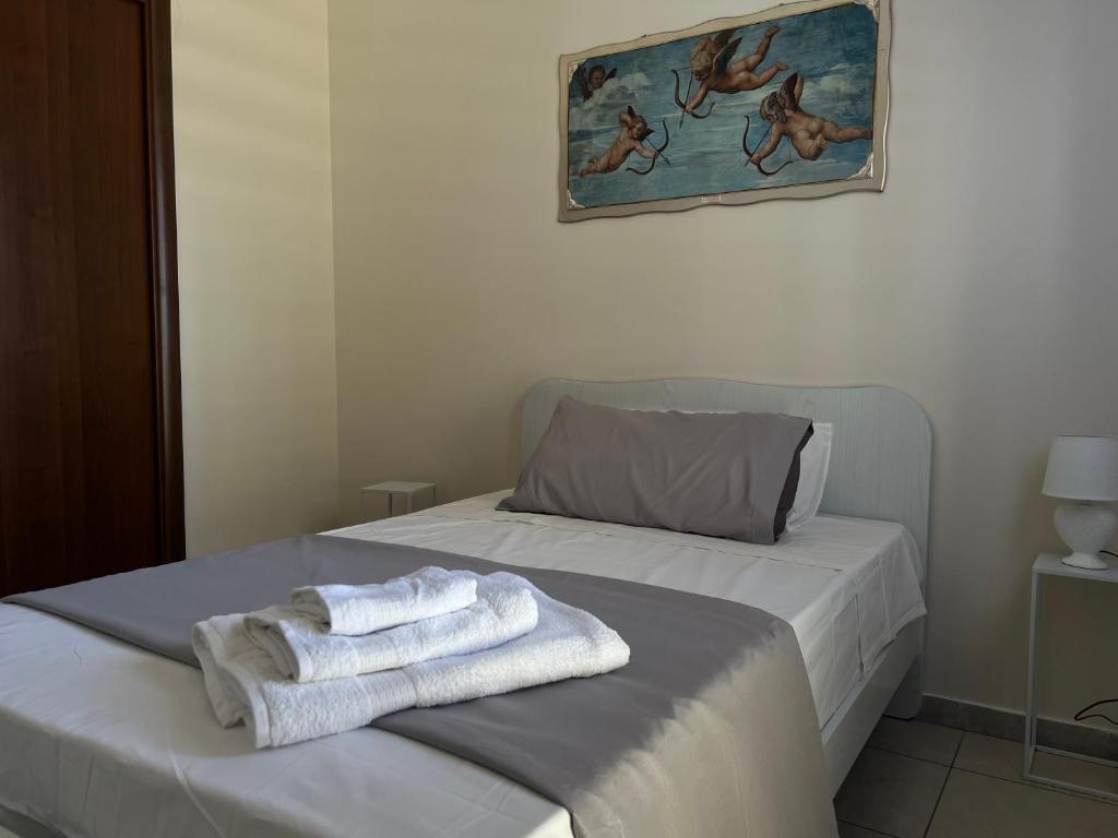 Postel nebo postele na pokoji v ubytování Incanto B&B