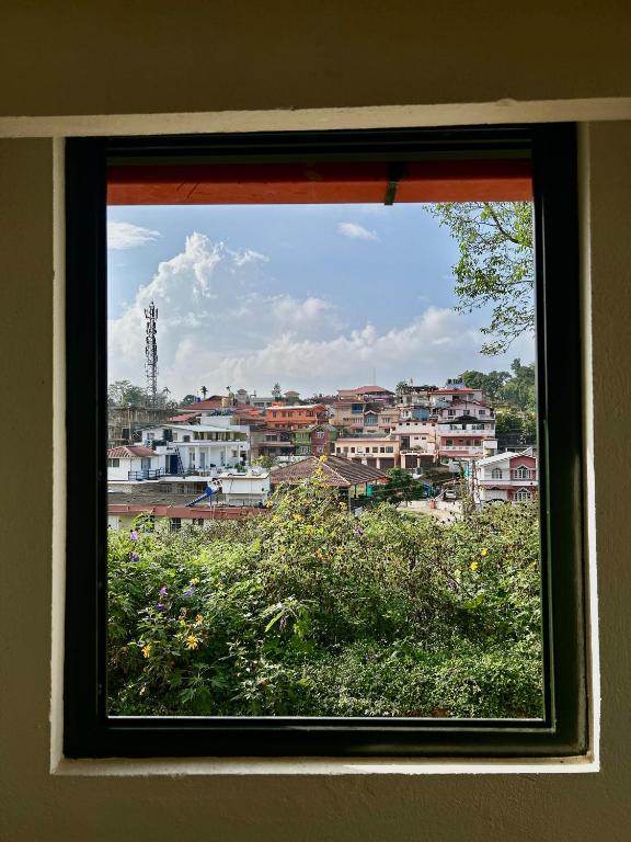 Nespecifikovaný výhled na destinaci Madikeri nebo výhled na město při pohledu z apartmánu