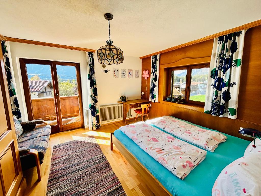 Postel nebo postele na pokoji v ubytování Haus Winkl 55
