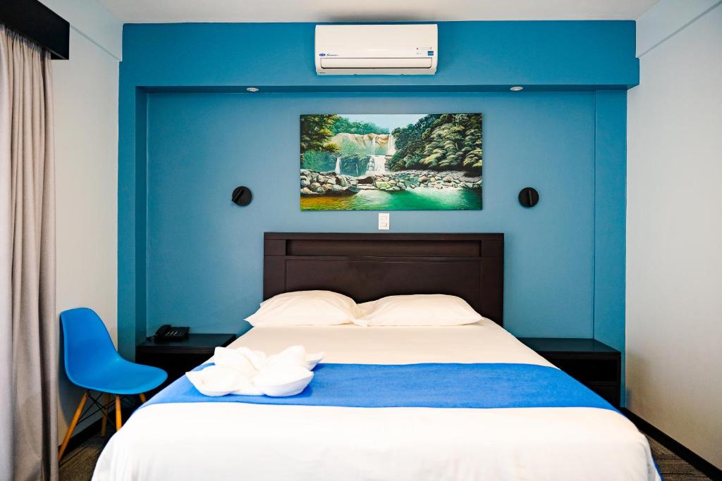 Postel nebo postele na pokoji v ubytování Hotel Luckys