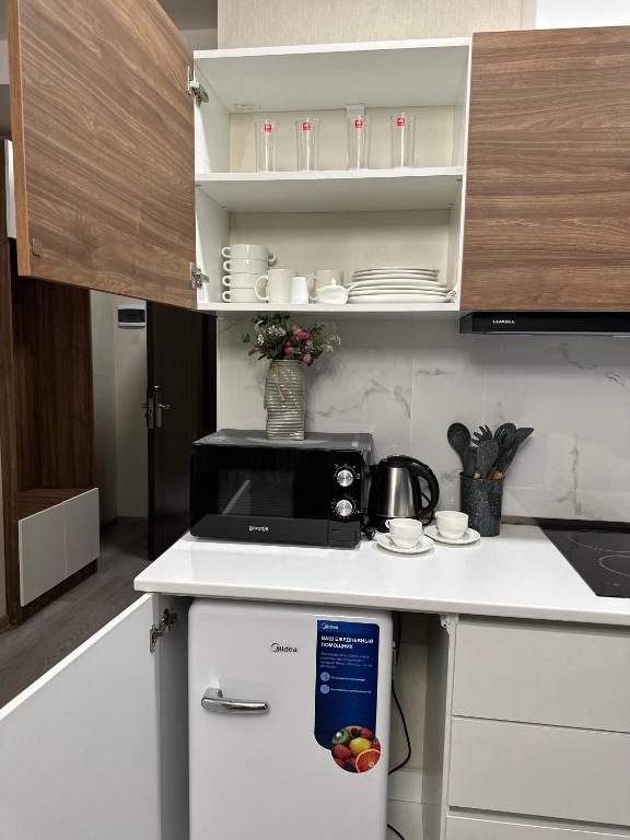 Kuchyň nebo kuchyňský kout v ubytování Kristal bakuriani Resort C block 202