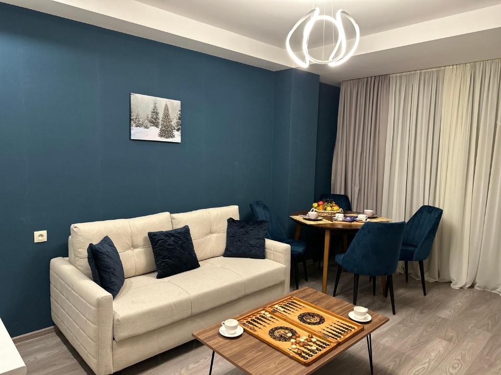 Posezení v ubytování Kristal bakuriani Resort C block 202