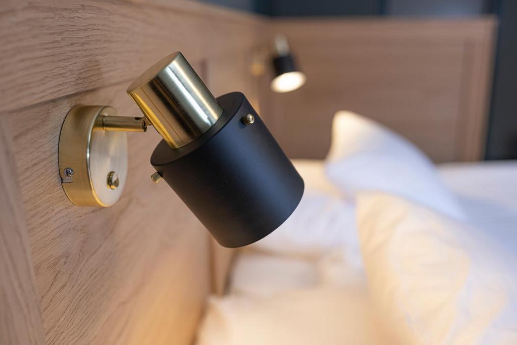 Postel nebo postele na pokoji v ubytování Lundsbrunn Resort & Spa