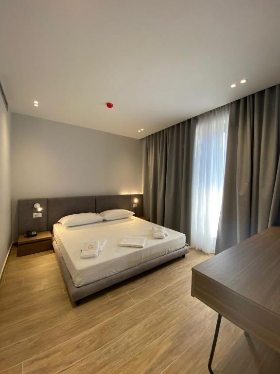 Postelja oz. postelje v sobi nastanitve A&G HOTEL