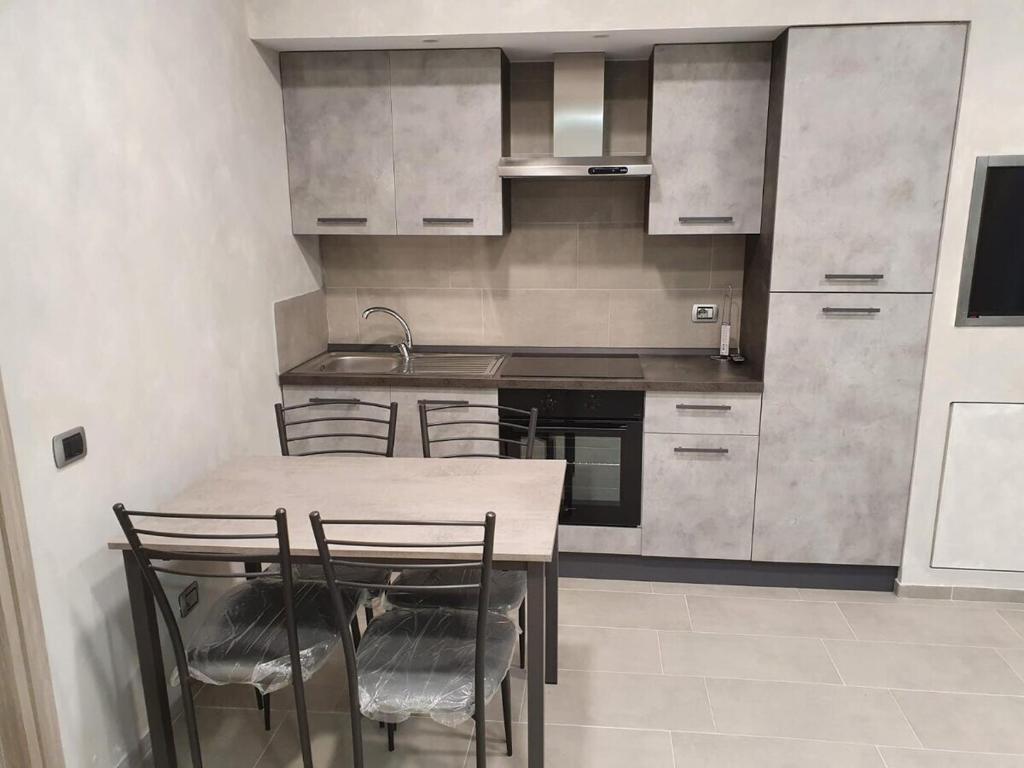 Kuchyň nebo kuchyňský kout v ubytování B&B FlOWER 2