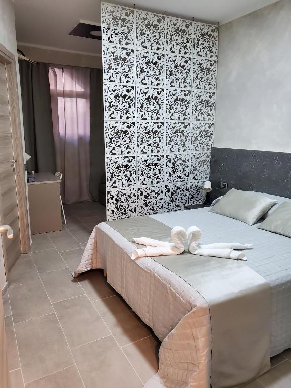 Postel nebo postele na pokoji v ubytování B&B FlOWER 2