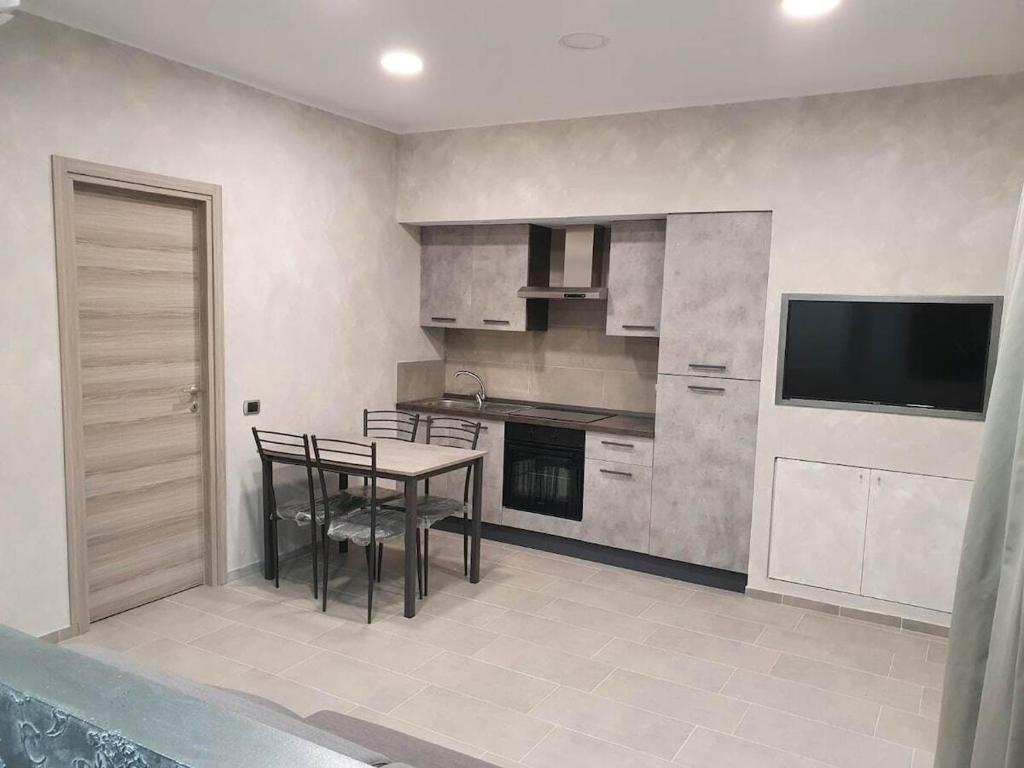 Kuchyň nebo kuchyňský kout v ubytování B&B FlOWER 2