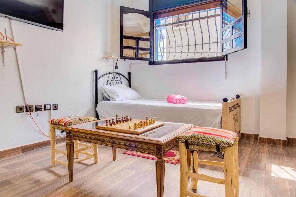 TV a/nebo společenská místnost v ubytování Dinosaur Anza Surf House