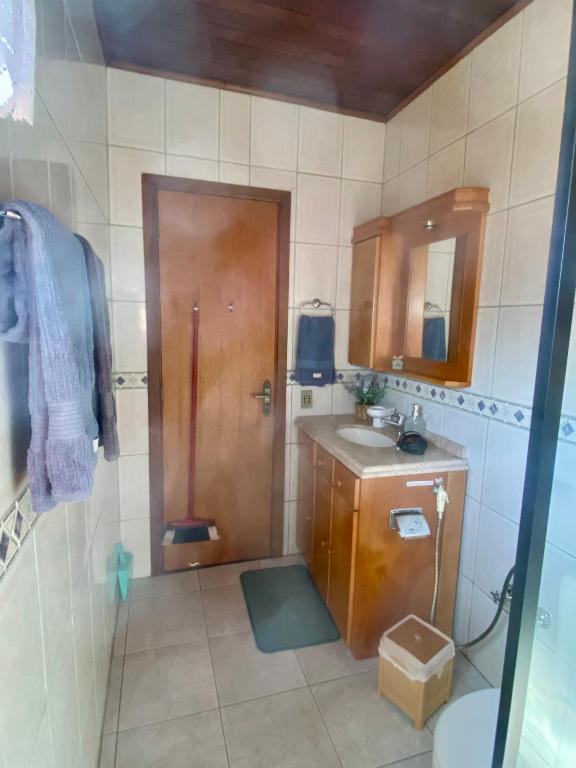 Koupelna v ubytování Suite 391 - Quarto privativo em casa