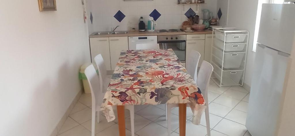 Kuchyňa alebo kuchynka v ubytovaní Apartmani Zulin