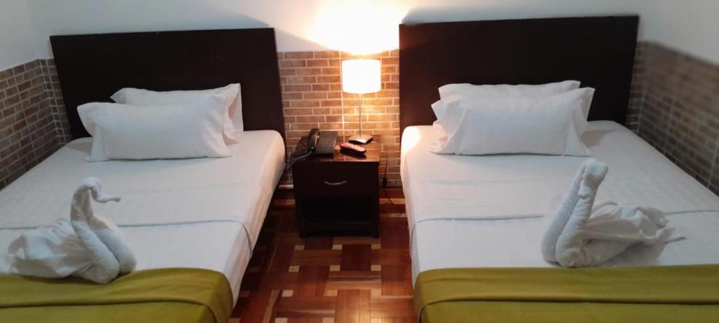 Postel nebo postele na pokoji v ubytování Casa Coliving Day 121