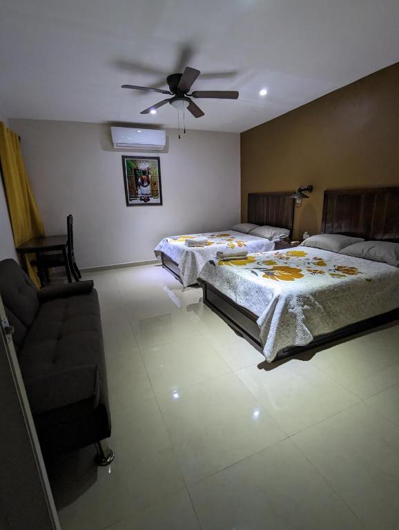 Postel nebo postele na pokoji v ubytování Hotel D’Cural