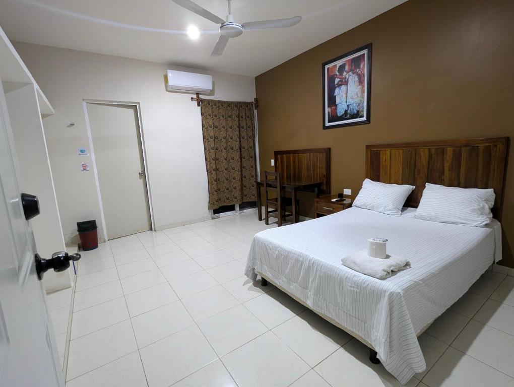 Postel nebo postele na pokoji v ubytování Hotel D’Cural