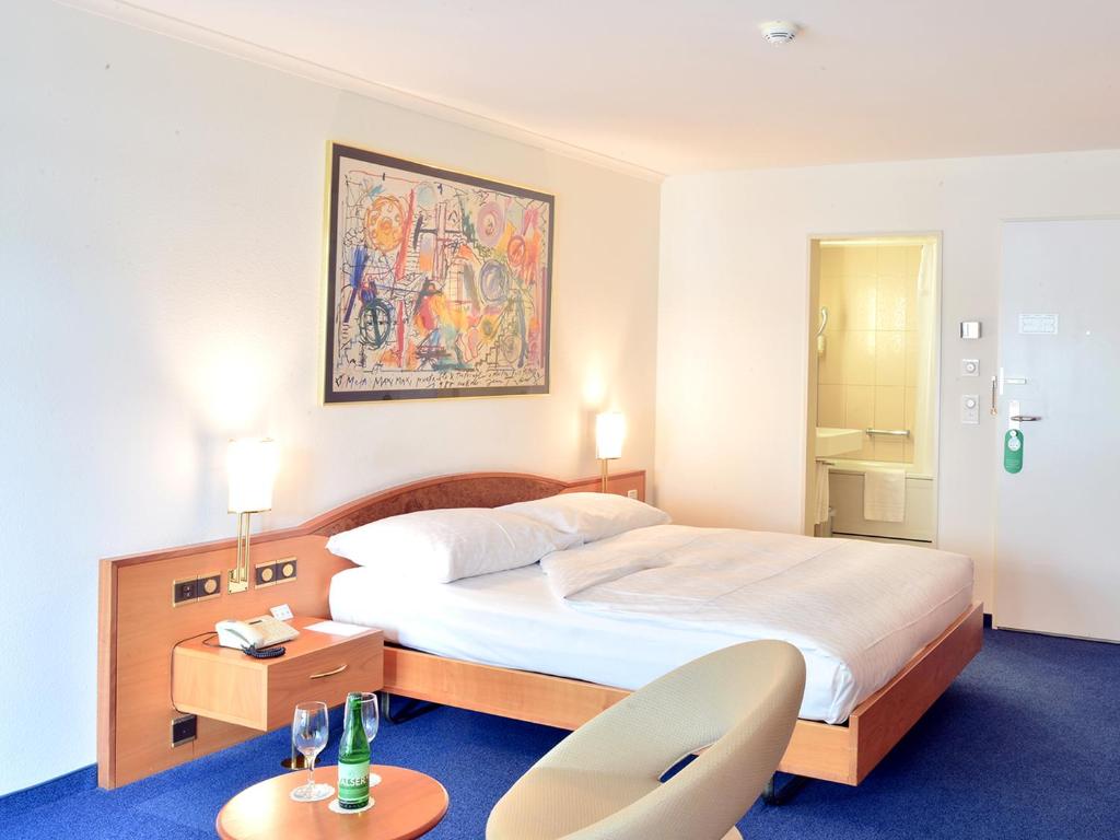 Postel nebo postele na pokoji v ubytování Residence Zug