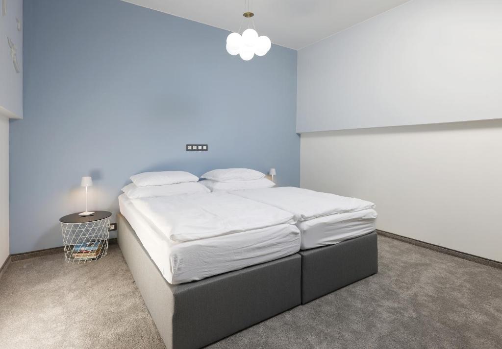 Letto o letti in una camera di Plavírna