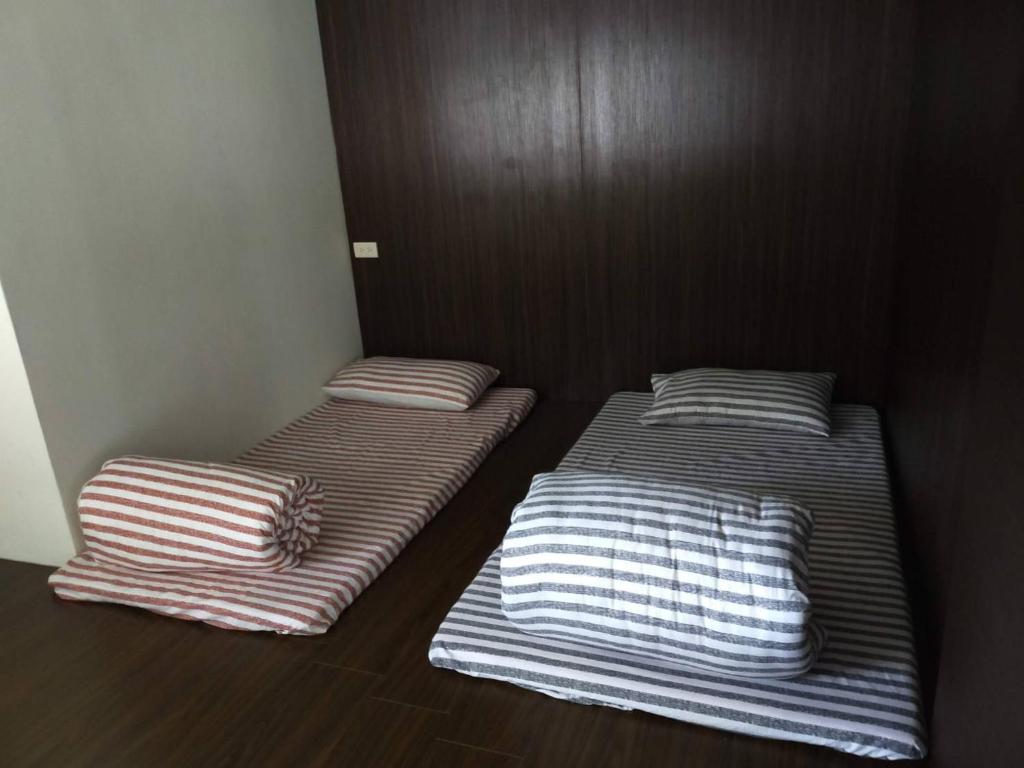 Postel nebo postele na pokoji v ubytování 督督工作室民宿
