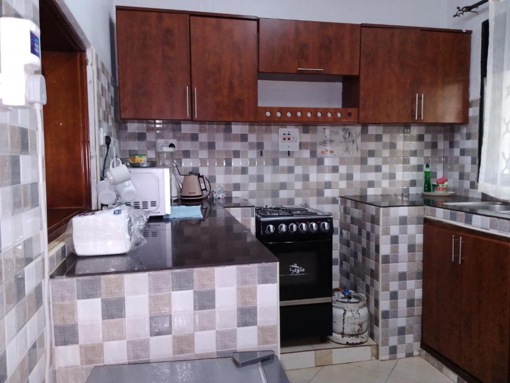 Kuchyň nebo kuchyňský kout v ubytování Kikaplace