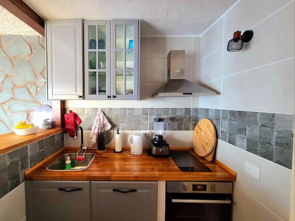 Kuchyň nebo kuchyňský kout v ubytování Sea lover's nest