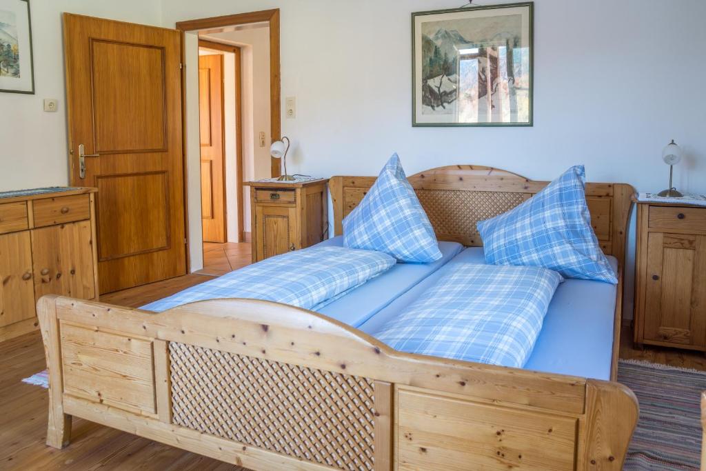 Postel nebo postele na pokoji v ubytování Haus Paradies am See