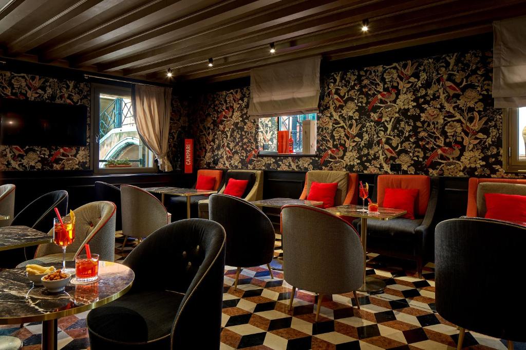 Posezení v ubytování UNAHOTELS Ala Venezia-Adults 16