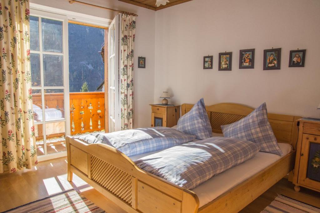 Postel nebo postele na pokoji v ubytování Haus Paradies am See