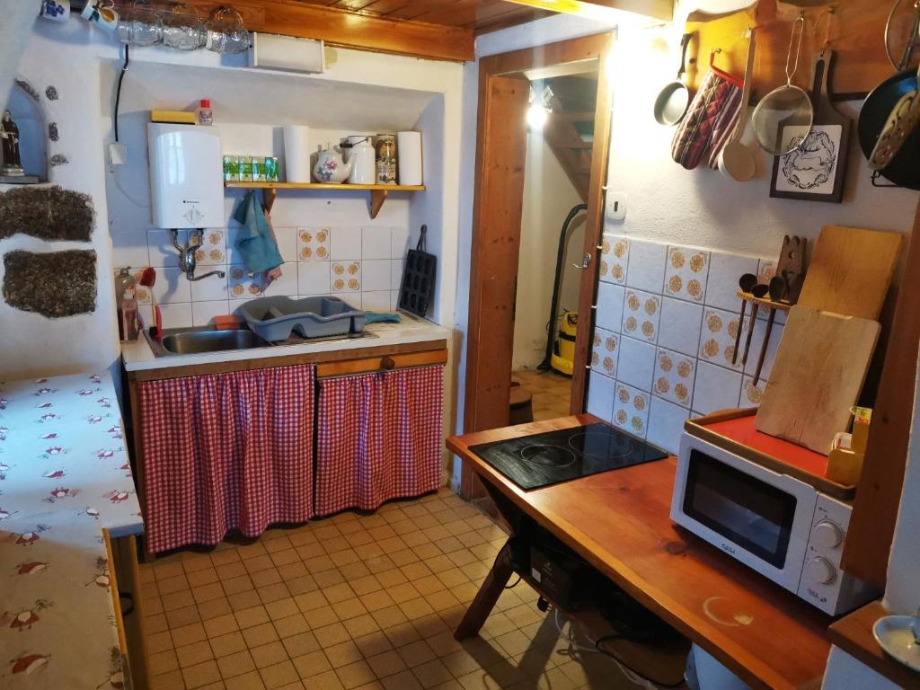 Kuchyň nebo kuchyňský kout v ubytování Chalupa u Matucha