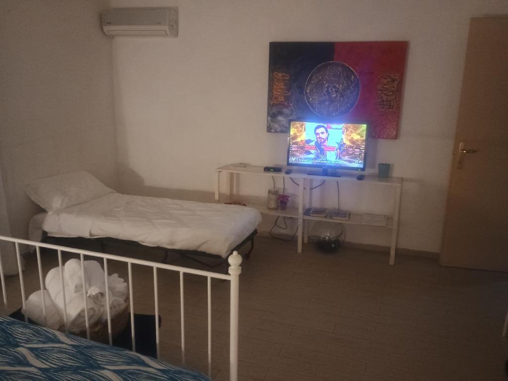 Postel nebo postele na pokoji v ubytování Terrazza Sui Sassi