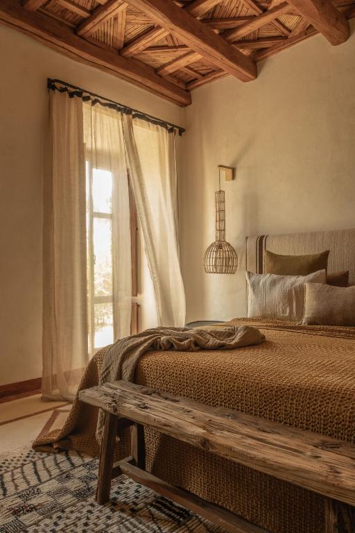 Postel nebo postele na pokoji v ubytování Kasbah d'if