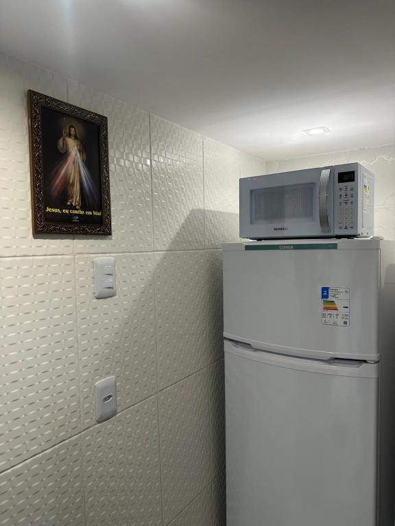 Kuchyň nebo kuchyňský kout v ubytování Cantinho Aconchegante - Quarto 04 Ar-condicionado