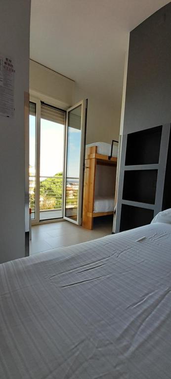 Postel nebo postele na pokoji v ubytování Hotel Marbella