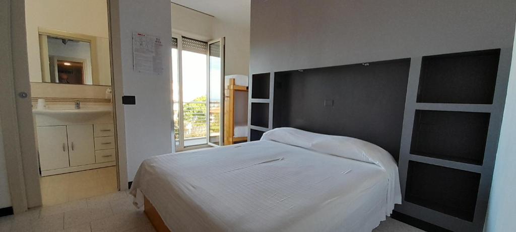 Postel nebo postele na pokoji v ubytování Hotel Marbella