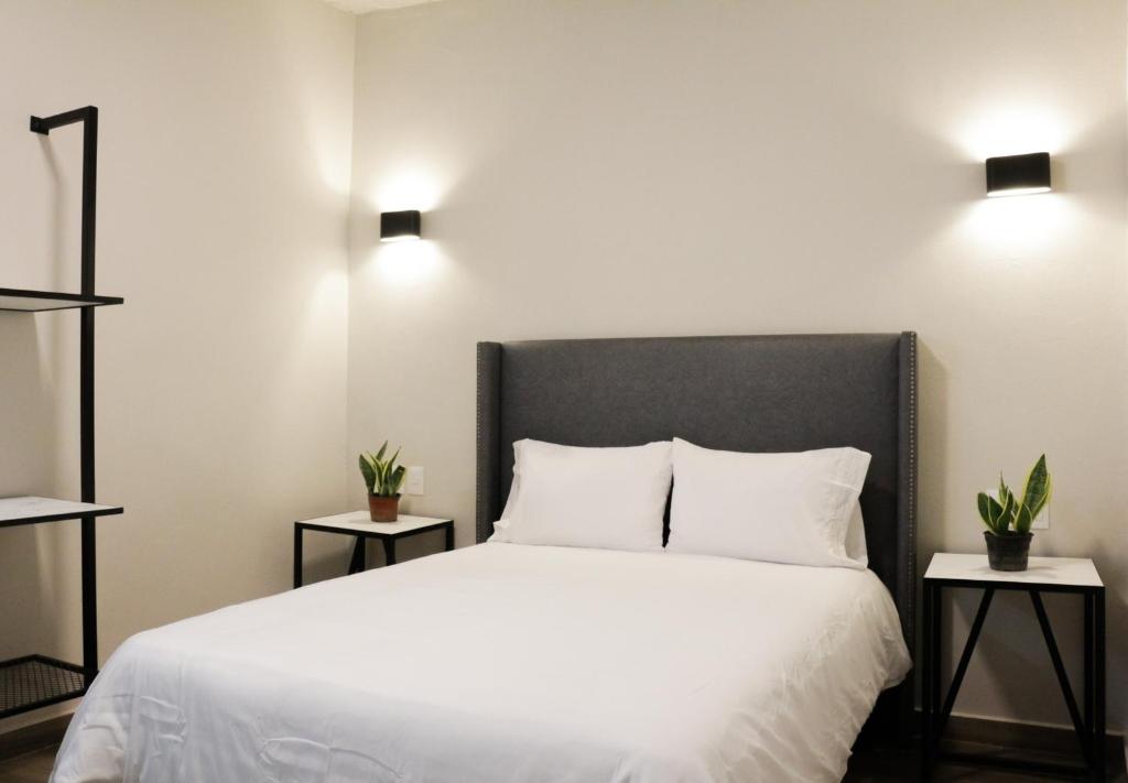 Postel nebo postele na pokoji v ubytování Casa Relox 43