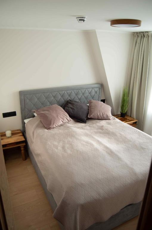 Postel nebo postele na pokoji v ubytování Suur-Posti Apartments