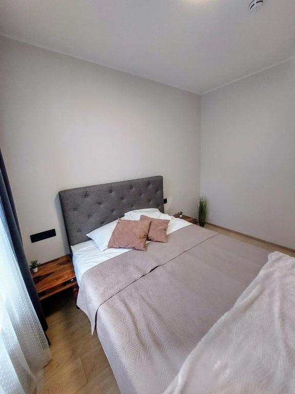 Postel nebo postele na pokoji v ubytování Suur-Posti Apartments