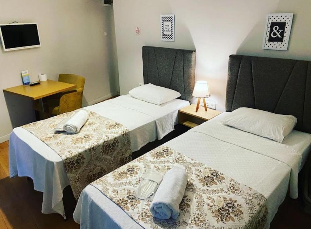 Postel nebo postele na pokoji v ubytování NO PROBLEM OTEL Pansiyon