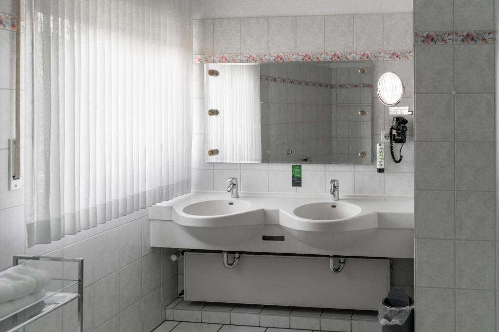 Koupelna v ubytování Hotel Klusenhof