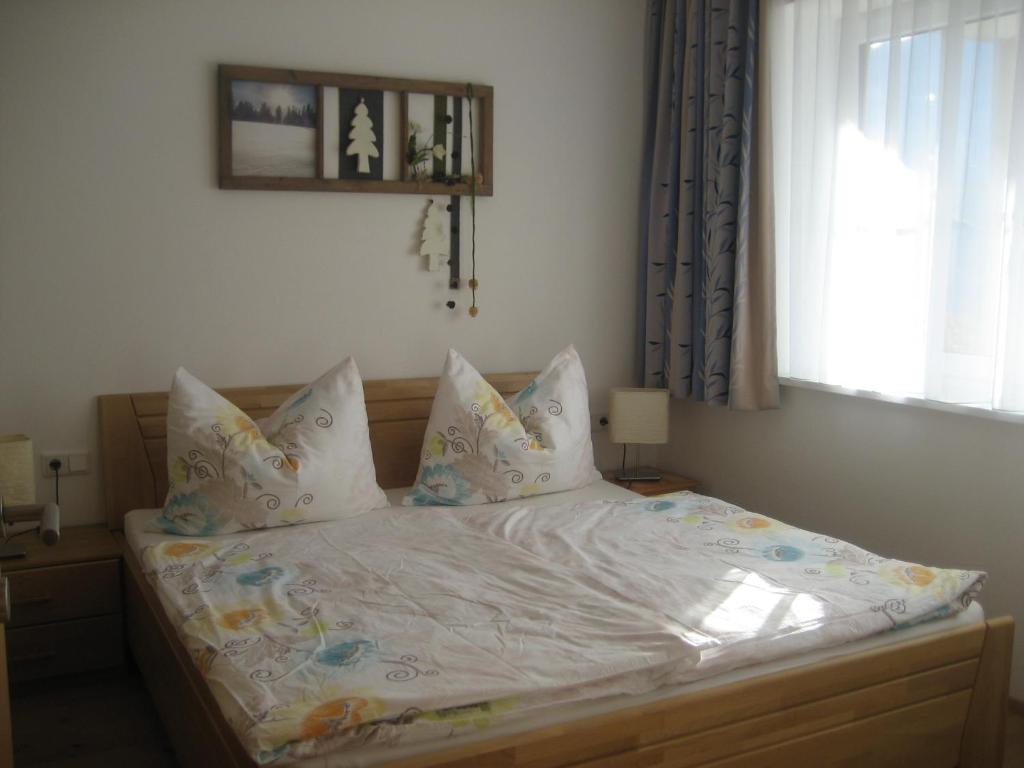 Postel nebo postele na pokoji v ubytování Appartement Alpenglück