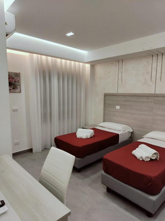 Postel nebo postele na pokoji v ubytování Bijou rooms