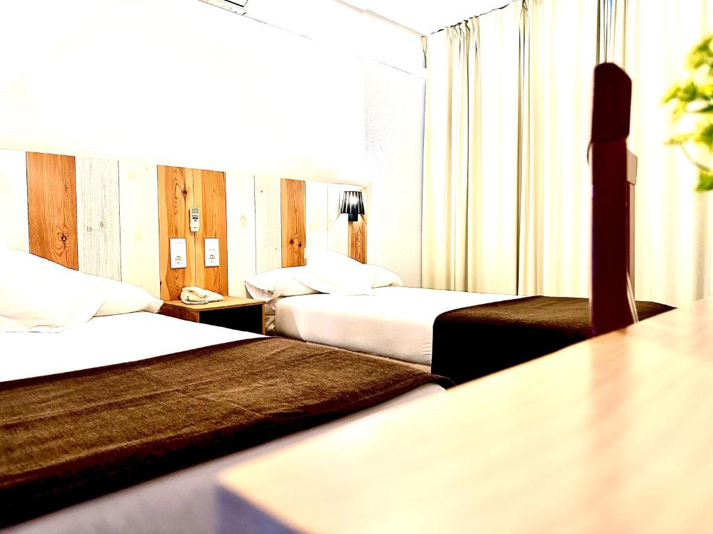 A bed or beds in a room at Arriadh