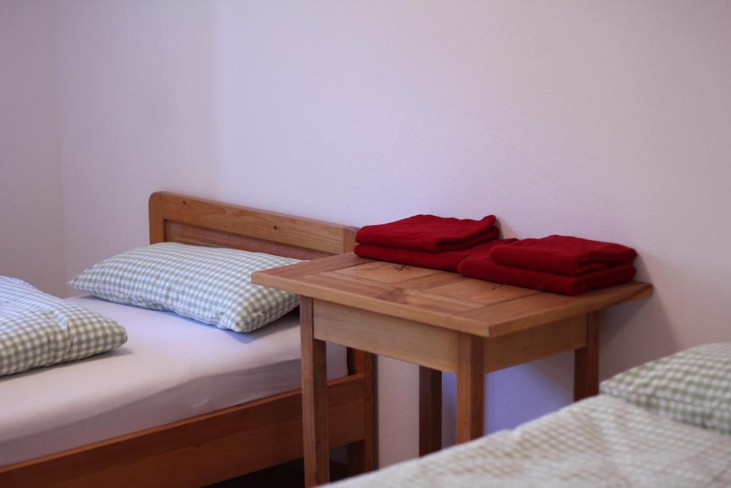 Postel nebo postele na pokoji v ubytování Zum Hirsch