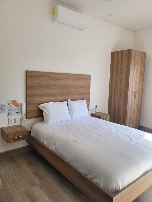 Postel nebo postele na pokoji v ubytování Casa Cacho