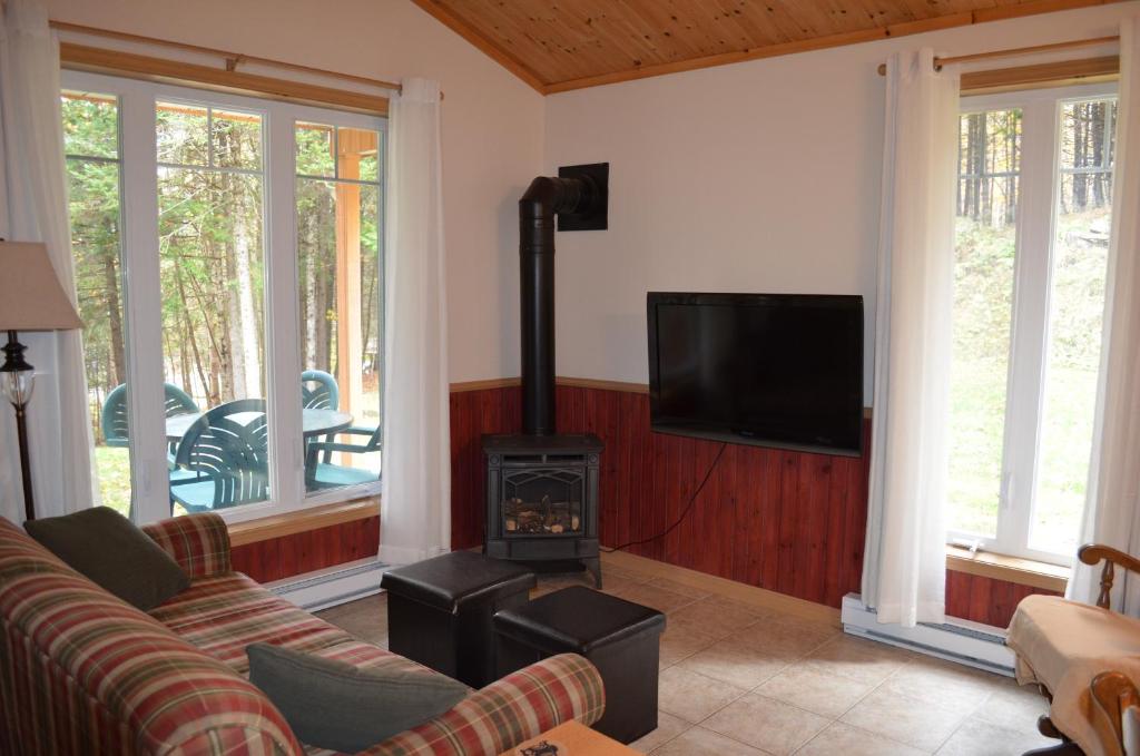 TV a/nebo společenská místnost v ubytování Chalet Esmeralda