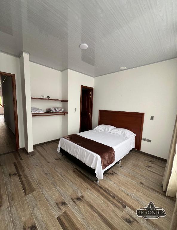 Postel nebo postele na pokoji v ubytování Hotel Beronica