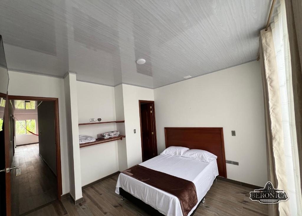 Postel nebo postele na pokoji v ubytování Hotel Beronica