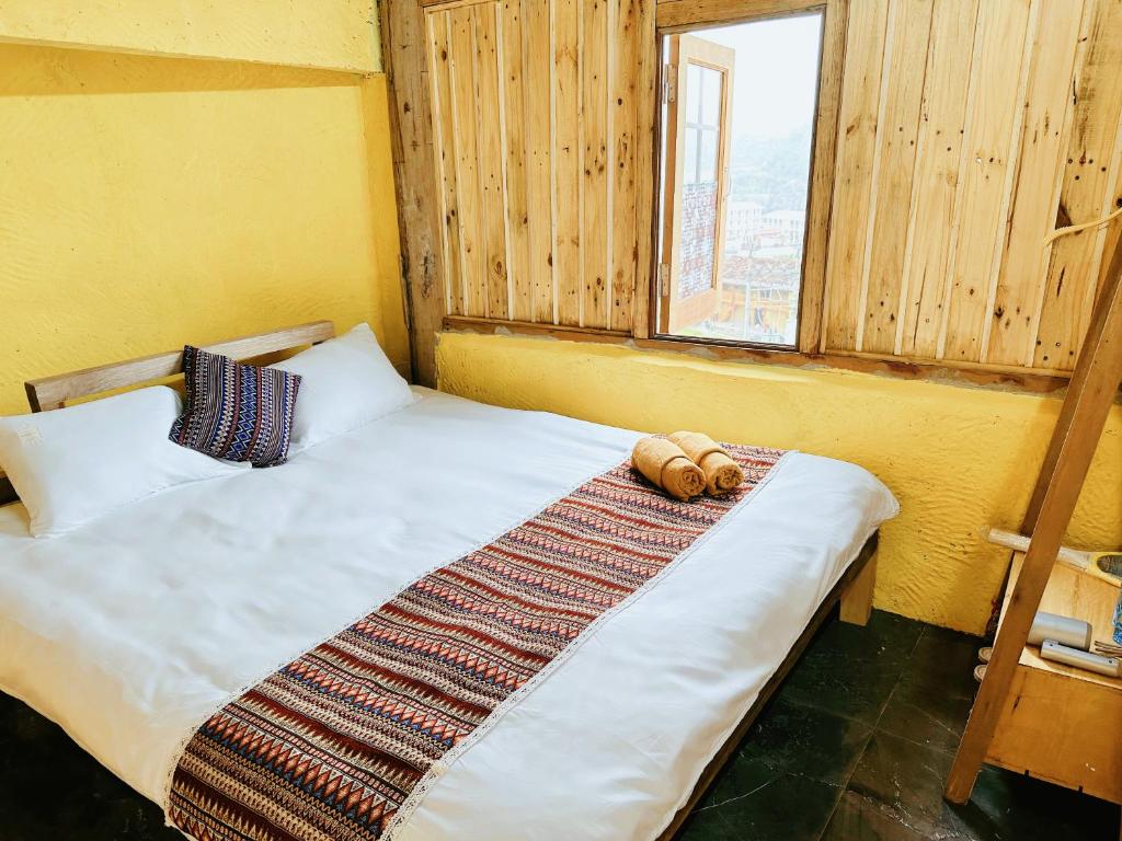 Voodi või voodid majutusasutuse HaPu Homestay toas