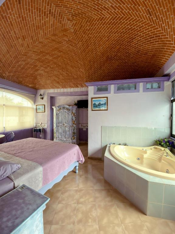 Postel nebo postele na pokoji v ubytování Casa Morada