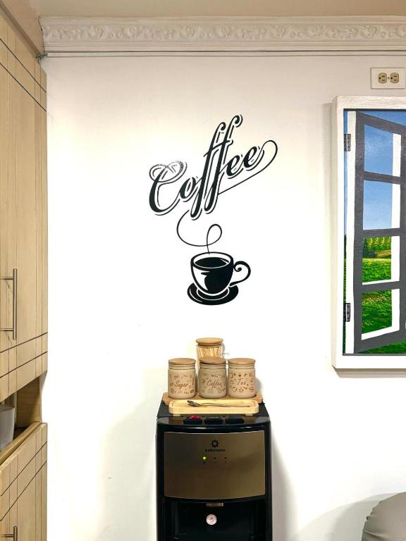 Příslušenství pro přípravu čaje a kávy v ubytování Hostal Bicentenario